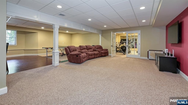 carpeted living area with baseboards, french doors, recessed lighting, and visible vents