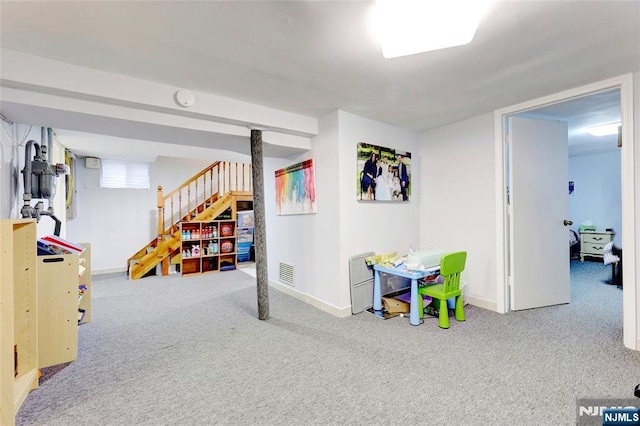 game room featuring carpet, visible vents, and baseboards