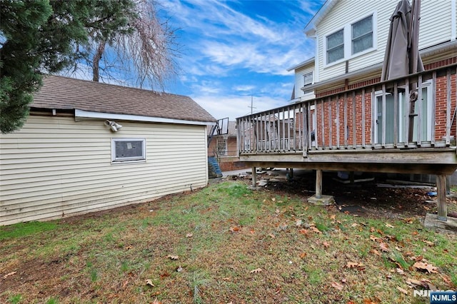 view of yard featuring a wooden deck