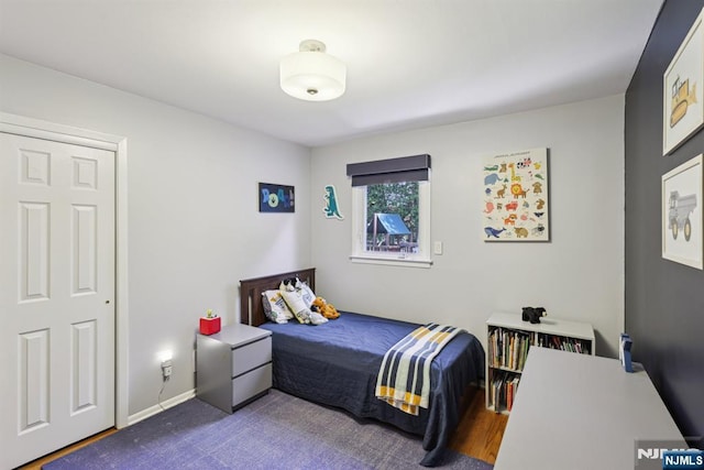 bedroom featuring baseboards