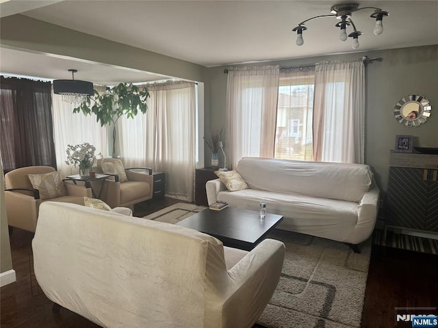 living room with wood finished floors