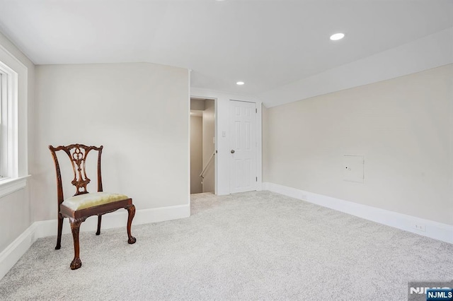 living area with carpet flooring, baseboards, vaulted ceiling, and recessed lighting