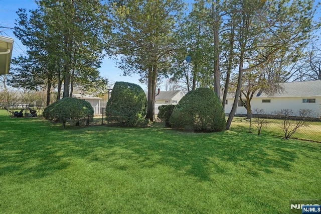 view of yard featuring fence