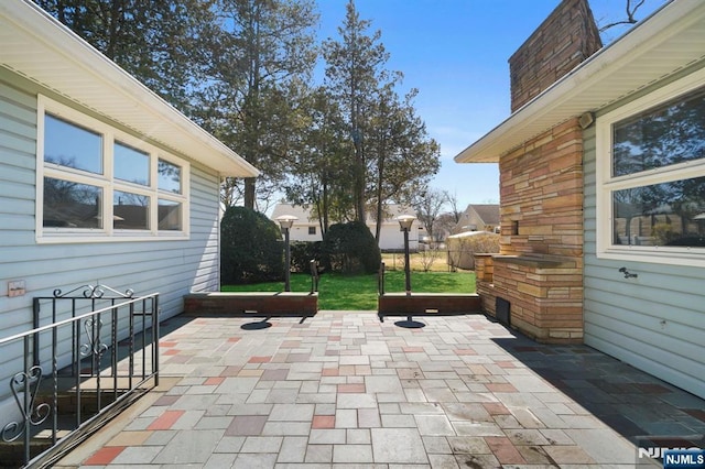 view of patio / terrace with fence