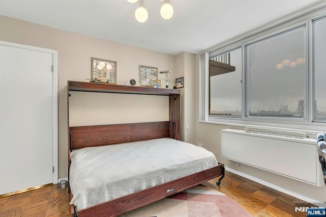 2150 Center Ave Unit 19A, Fort Lee, NJ 07024 - bedroom with radiator heating unit