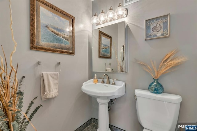 2150 Center Ave Unit 19A, Fort Lee, NJ 07024 - bathroom with toilet and baseboards