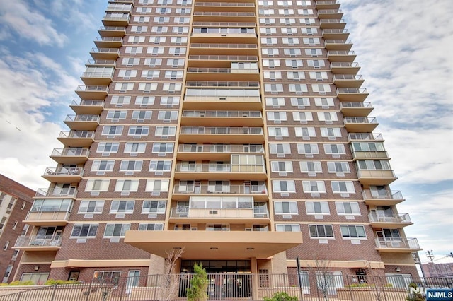 2150 Center Ave Unit 19A, Fort Lee, NJ 07024 - view of apartment building / complex with fence