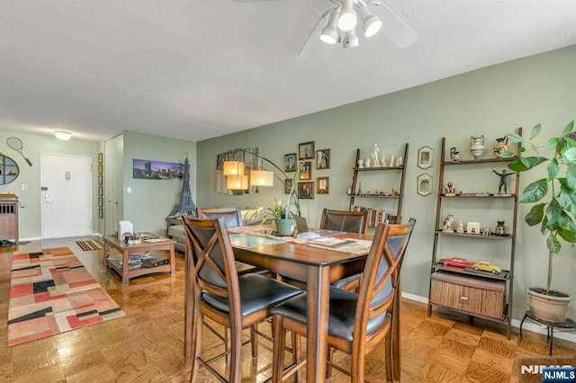 2150 Center Ave Unit 19A, Fort Lee, NJ 07024 - dining room featuring ceiling fan and baseboards
