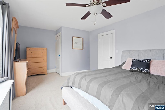 126 Beech St, Nutley, NJ 07110 - bedroom featuring light colored carpet, baseboards, and ceiling fan