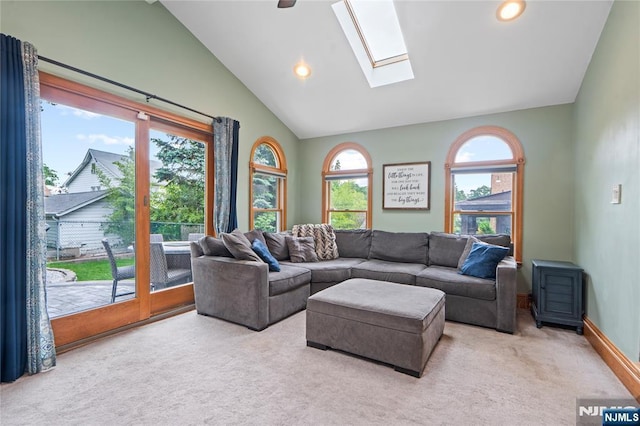 126 Beech St, Nutley, NJ 07110 - carpeted living area featuring a skylight, recessed lighting, baseboards, and high vaulted ceiling