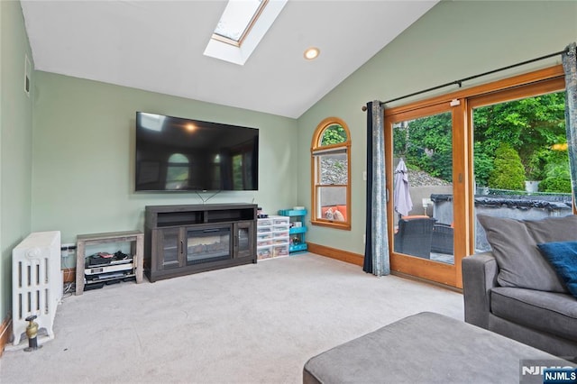 126 Beech St, Nutley, NJ 07110 - carpeted living room featuring vaulted ceiling, plenty of natural light, a skylight, recessed lighting, and baseboards