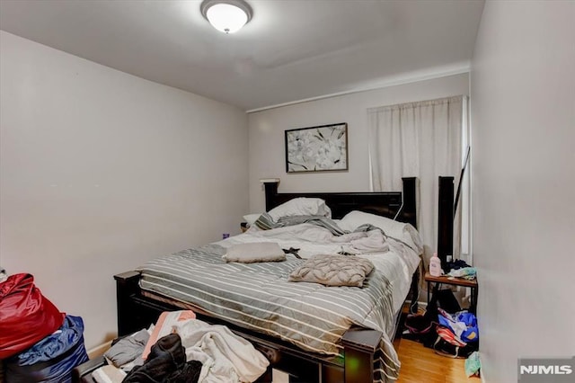 229 21st St, Irvington, NJ 07111 - bedroom featuring wood finished floors