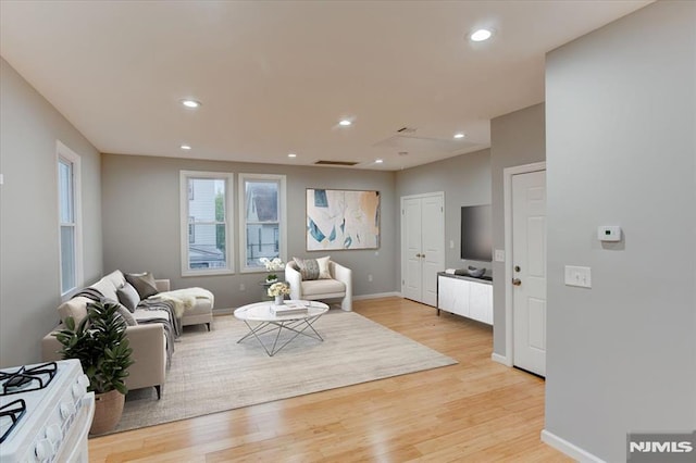 229 21st St, Irvington, NJ 07111 - living room with visible vents, light wood-style flooring, recessed lighting, and baseboards