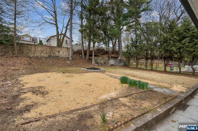 view of yard with fence