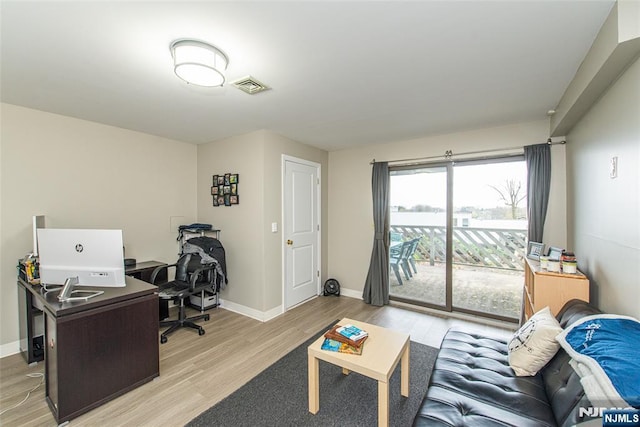 79 Adams Ter Unit 79, Clifton, NJ 07013 - home office featuring visible vents, baseboards, and light wood-type flooring