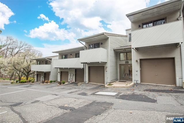 79 Adams Ter Unit 79, Clifton, NJ 07013 - view of property featuring french doors and an attached garage
