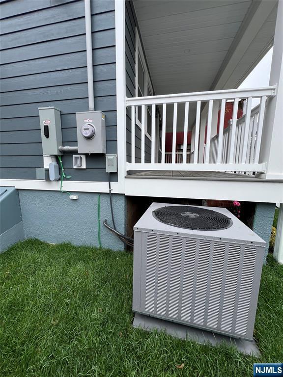 79 Van Winkle Ave, Hawthorne, NJ 07506 - exterior view of central AC and electric meter
