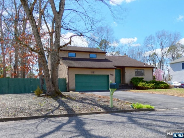 112 Heatherington Ct, Lacey, NJ 08734 - traditional-style home with fence, a garage, and driveway