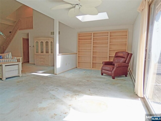 112 Heatherington Ct, Lacey, NJ 08734 - unfurnished room with vaulted ceiling with skylight, baseboards, a ceiling fan, and carpet floors
