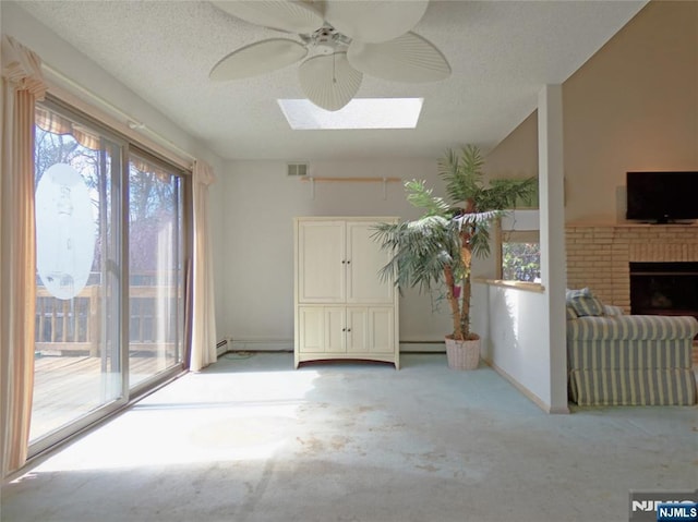 112 Heatherington Ct, Lacey, NJ 08734 - unfurnished sunroom with visible vents, a baseboard heating unit, baseboard heating, and a skylight