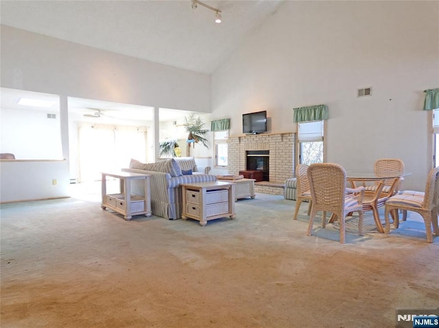 112 Heatherington Ct, Lacey, NJ 08734 - living area with light carpet, high vaulted ceiling, visible vents, and a wealth of natural light