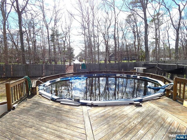 112 Heatherington Ct, Lacey, NJ 08734 - view of pool with a fenced backyard, a wooden deck, and a fenced in pool