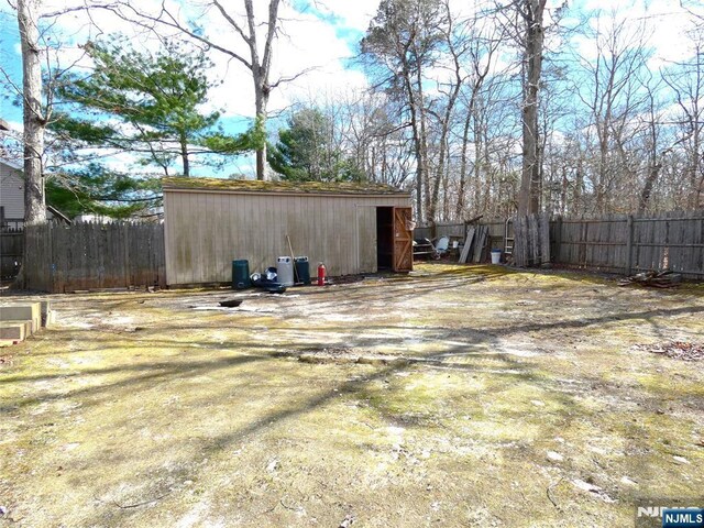 112 Heatherington Ct, Lacey, NJ 08734 - view of yard with fence and an outbuilding