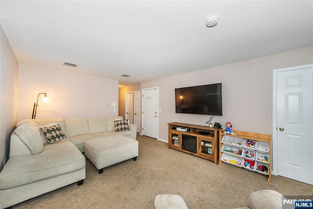 carpeted living room with visible vents
