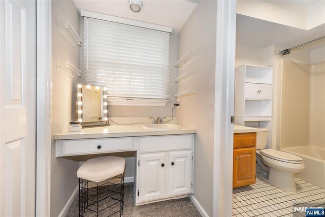 bathroom with toilet, vanity, shower / tub combination, and tile patterned flooring