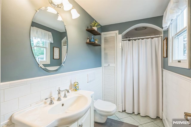 2 Beechwood Ave, Par-Troy Hills Twp, NJ 07034 - full bathroom featuring tile walls, toilet, tile patterned flooring, vanity, and wainscoting