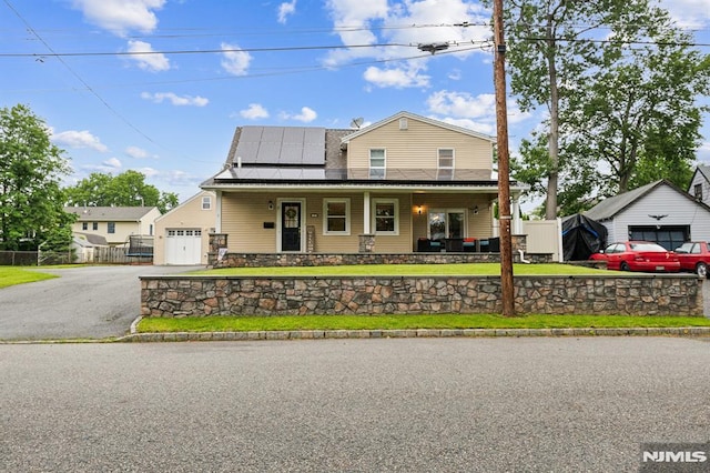 2 Beechwood Ave, Par-Troy Hills Twp, NJ 07034 - view of front of house with covered porch, roof mounted solar panels, and a garage