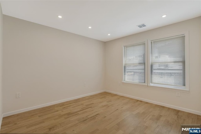 560 18th St, Newark, NJ 07103 - unfurnished room featuring recessed lighting, light wood-style floors, visible vents, and baseboards