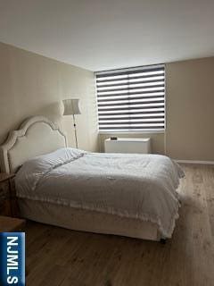 770ANDERS Anderson Ave Unit 4A, Cliffside Park, NJ 07010 - bedroom with baseboards and wood finished floors