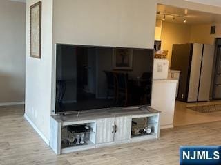 770ANDERS Anderson Ave Unit 4A, Cliffside Park, NJ 07010 - details featuring refrigerator, baseboards, and wood finished floors