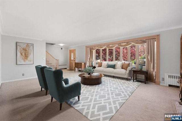 living area featuring light colored carpet, ornamental molding, radiator heating unit, and stairs