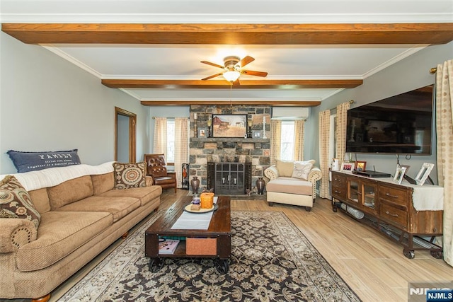 living area with wood finished floors, a ceiling fan, ornamental molding, beamed ceiling, and a wall mounted AC