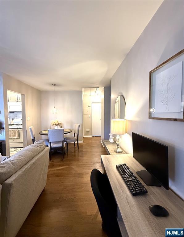 25 River Unit B10, Nutley, NJ 07110 - living area with wood finished floors