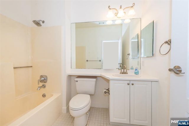 bathroom with baseboards, toilet, vanity, shower / bathtub combination, and tile patterned floors