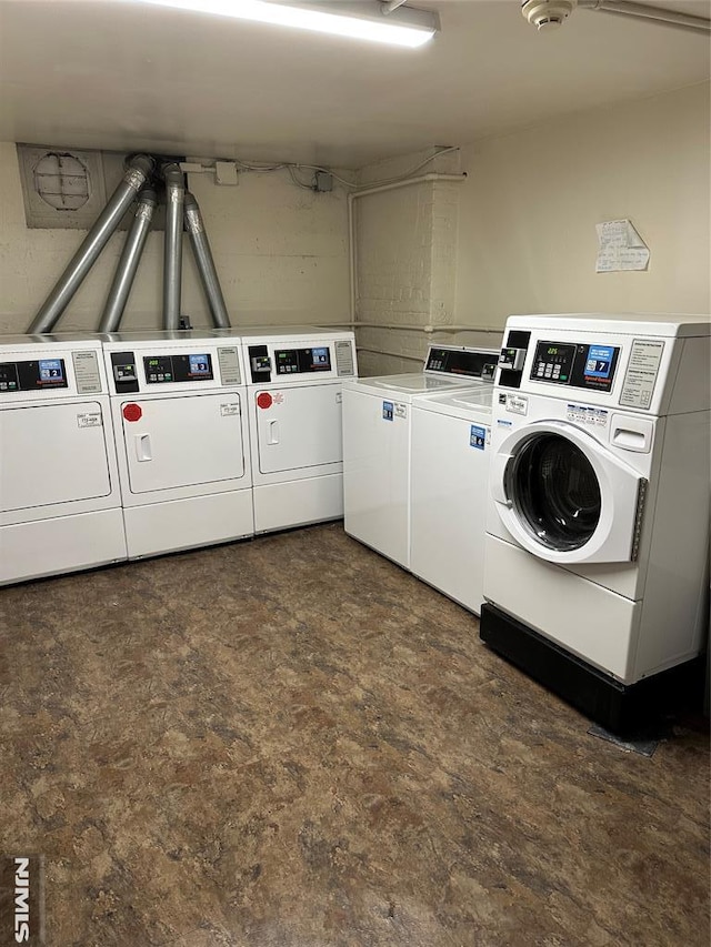 shared laundry area with separate washer and dryer
