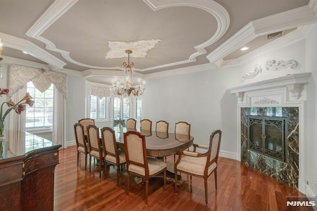 22 Nottingham Ct, Ringwood, NJ 07456 - dining area with a chandelier, crown molding, wood finished floors, baseboards, and coffered ceiling