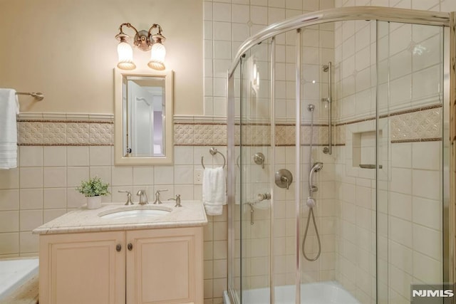 22 Nottingham Ct, Ringwood, NJ 07456 - full bathroom featuring tiled shower, tile walls, and vanity