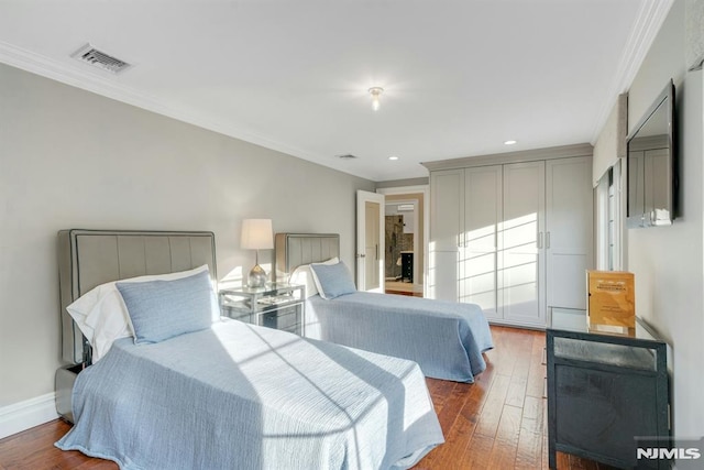 22 Nottingham Ct, Ringwood, NJ 07456 - bedroom featuring wood-type flooring, ornamental molding, recessed lighting, and baseboards