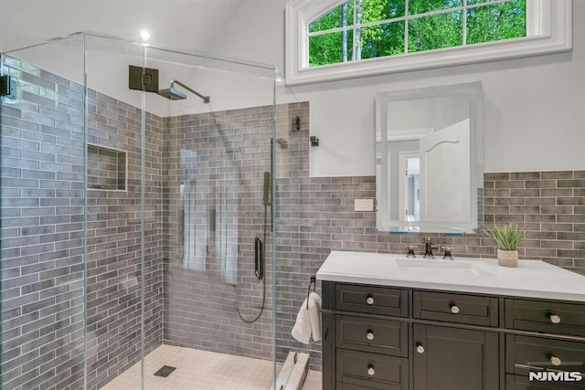 22 Nottingham Ct, Ringwood, NJ 07456 - bathroom with a stall shower, vanity, and tile walls