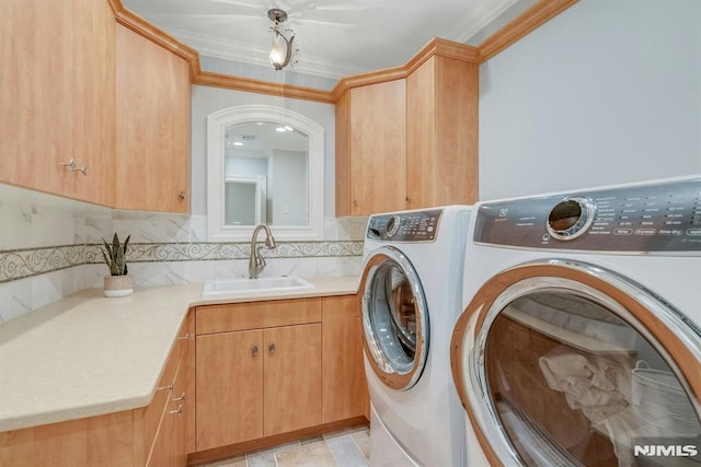22 Nottingham Ct, Ringwood, NJ 07456 - laundry room with washing machine and dryer, cabinet space, and crown molding