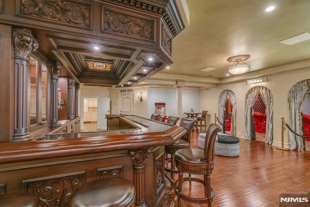 22 Nottingham Ct, Ringwood, NJ 07456 - bar area featuring ornate columns, baseboards, hardwood / wood-style floors, and recessed lighting