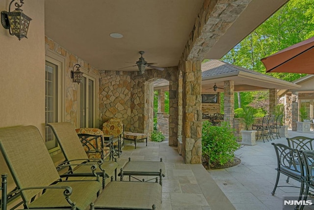 22 Nottingham Ct, Ringwood, NJ 07456 - view of patio / terrace with ceiling fan and an outdoor bar