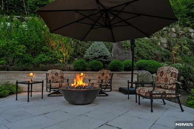 22 Nottingham Ct, Ringwood, NJ 07456 - view of patio / terrace featuring a fire pit