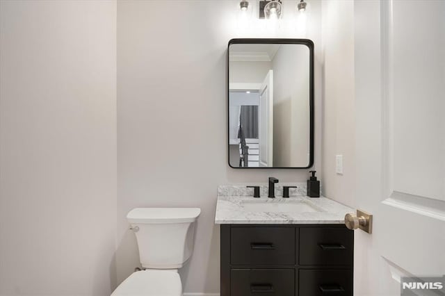 133 Graham Ter, Saddle Brook, NJ 07663 - bathroom with vanity and ornamental molding