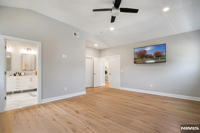 133 Graham Ter, Saddle Brook, NJ 07663 - unfurnished bedroom with vaulted ceiling, light wood-style floors, washer / clothes dryer, ensuite bath, and recessed lighting