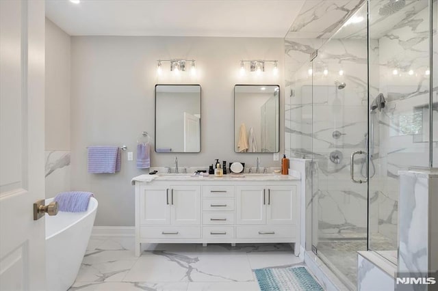 133 Graham Ter, Saddle Brook, NJ 07663 - full bathroom featuring marble finish floors, a marble finish shower, a freestanding tub, and double vanity